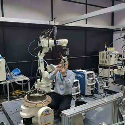 OTCのための自動溶接のロボットを材料扱うアーク溶接のためのロボット溶接ワークステーションFD-V25 6軸線のロボット